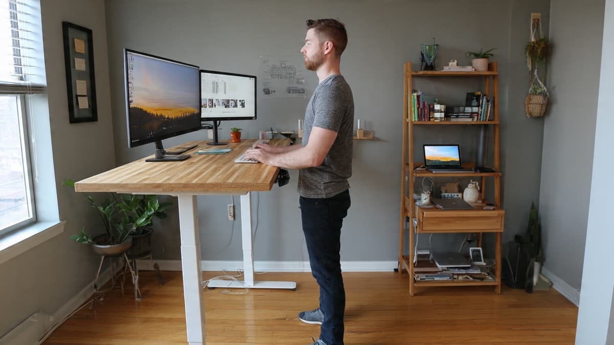 Standing desk adjusted to elbow height